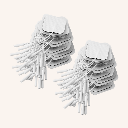 Stacks of replacement TENS electrode pads for the period cramp simulator